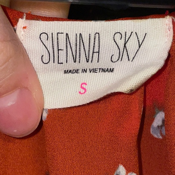 Red Blouse with White Floral design - Picture 2 of 3